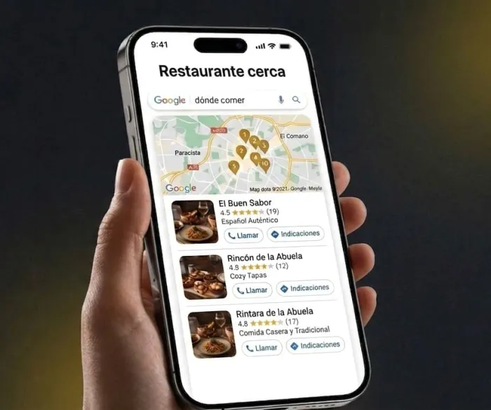 Móvil mostrando una búsqueda de 'restaurante cerca' con resultados en el mapa de Google