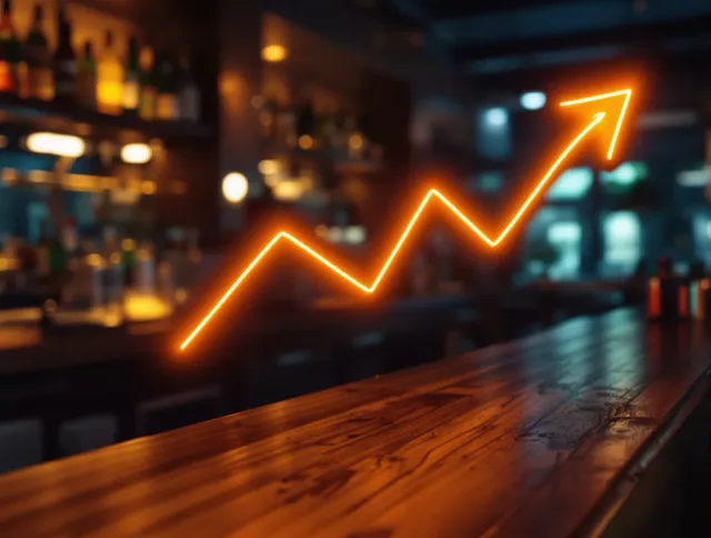 Gráfico de crecimiento luminoso sobre la barra de madera de un restaurante